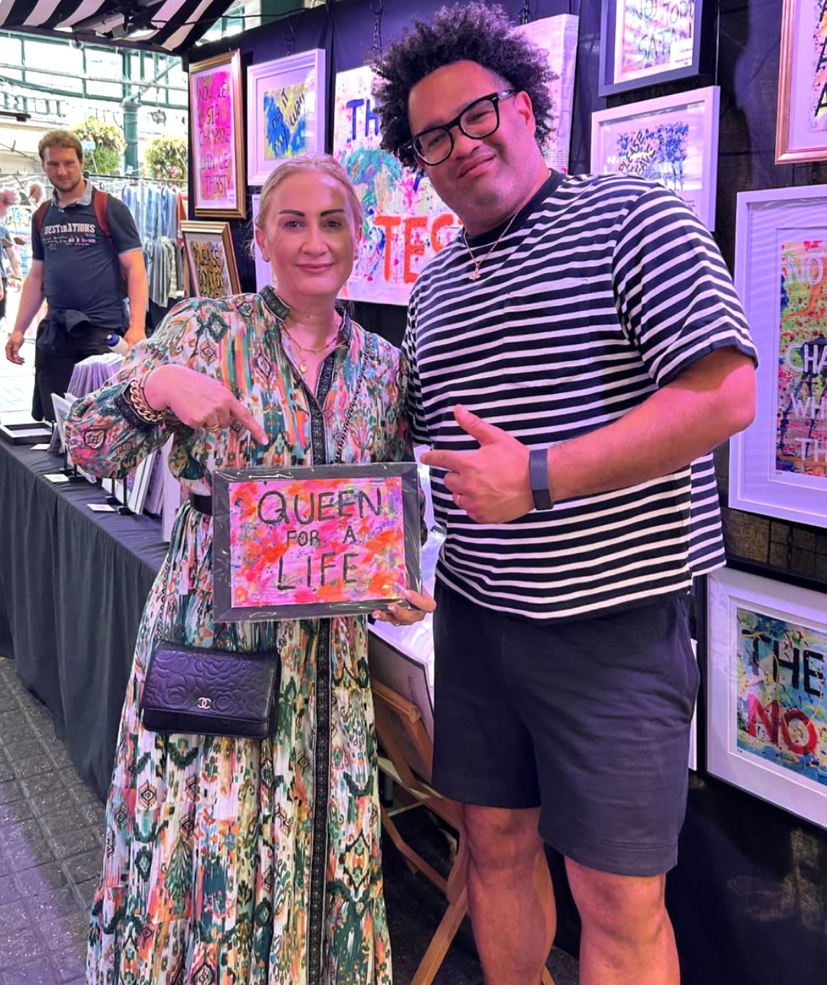 A collector with Queen For A Life at Luis Alvarez's stall